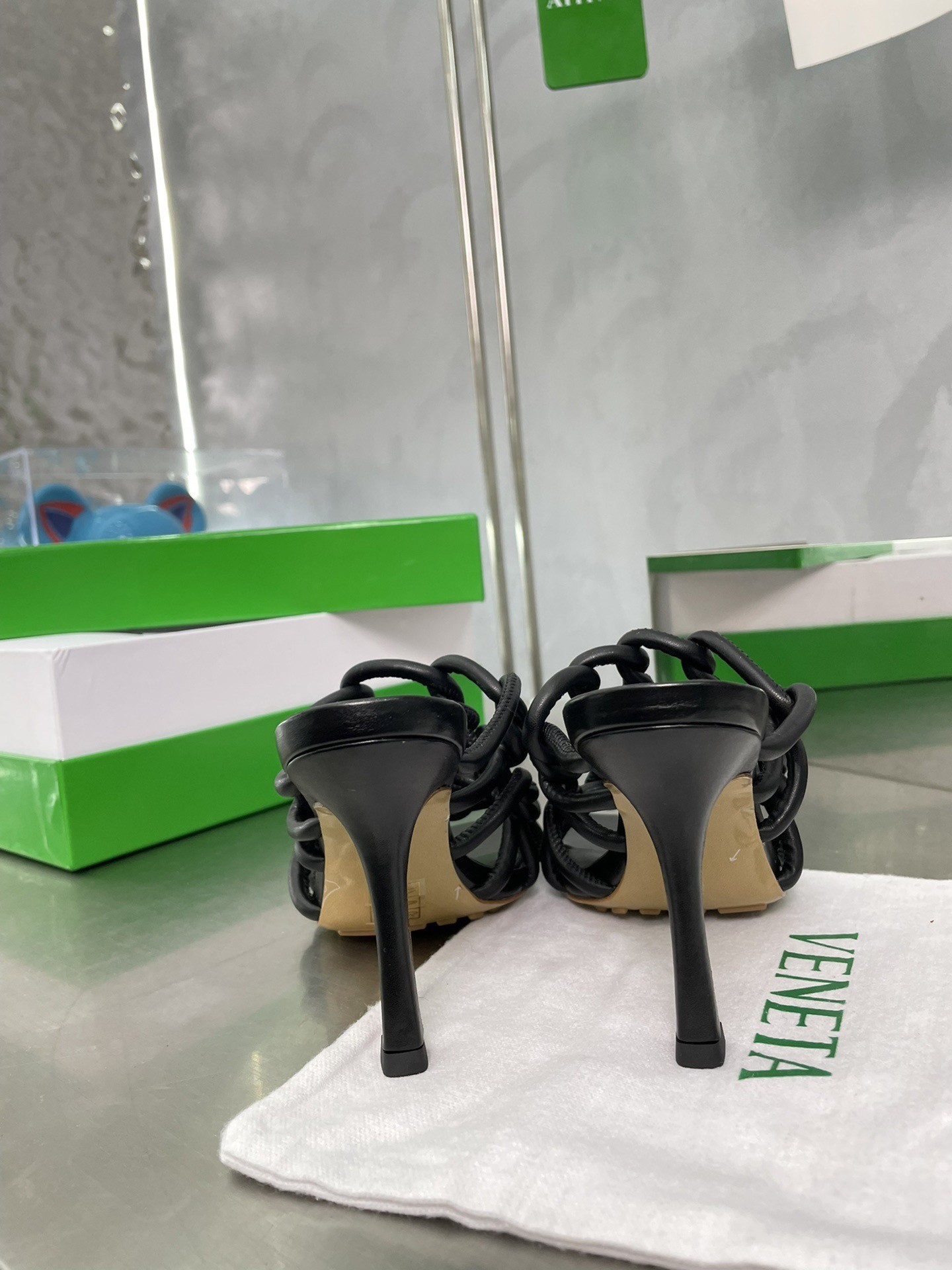 bo*te*ga Ve*ne*ta stretch twist sandals in black lambskin