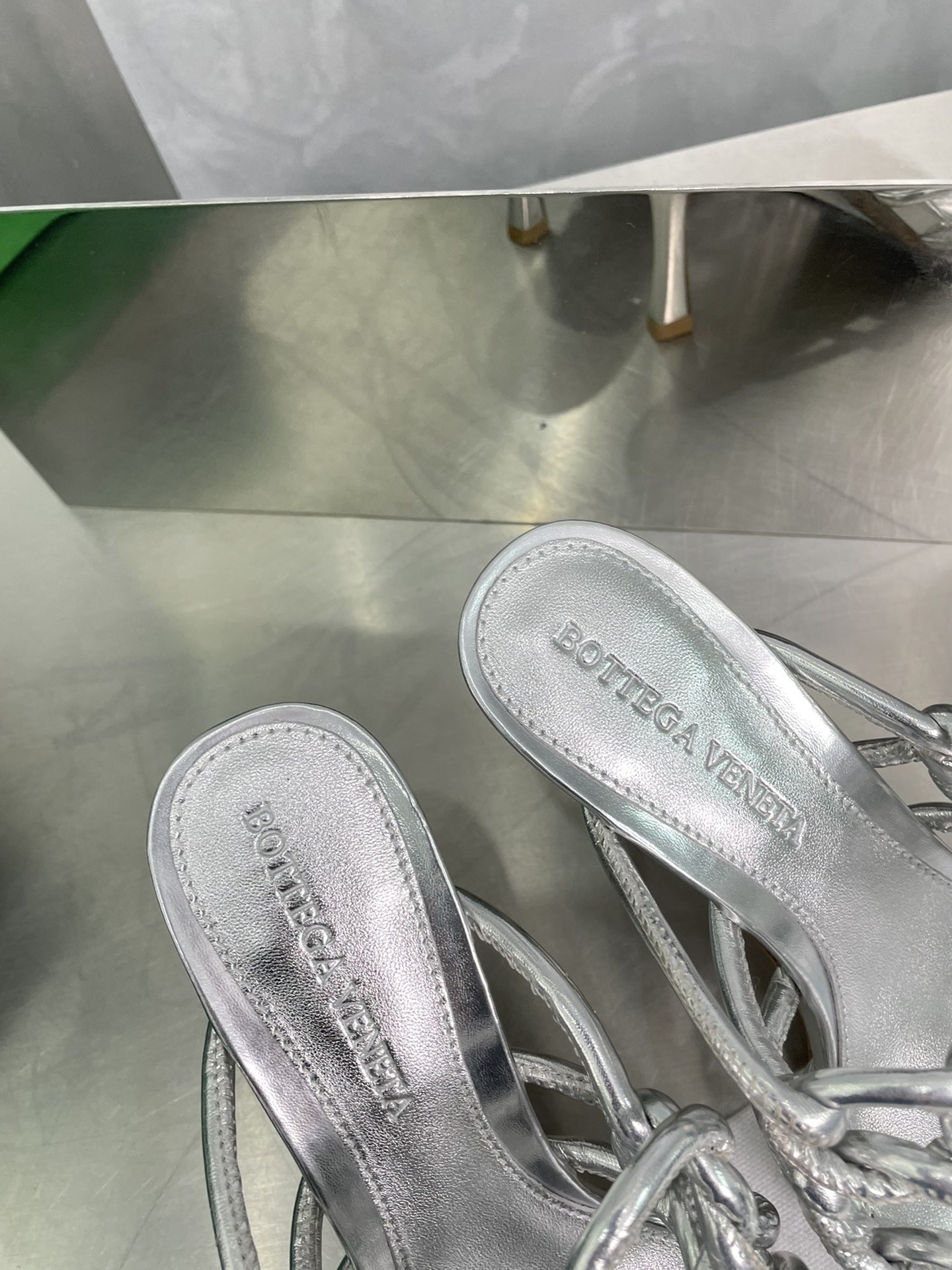bo*te*ga Ve*ne*ta stretch twist sandals in silver metallic lambskin