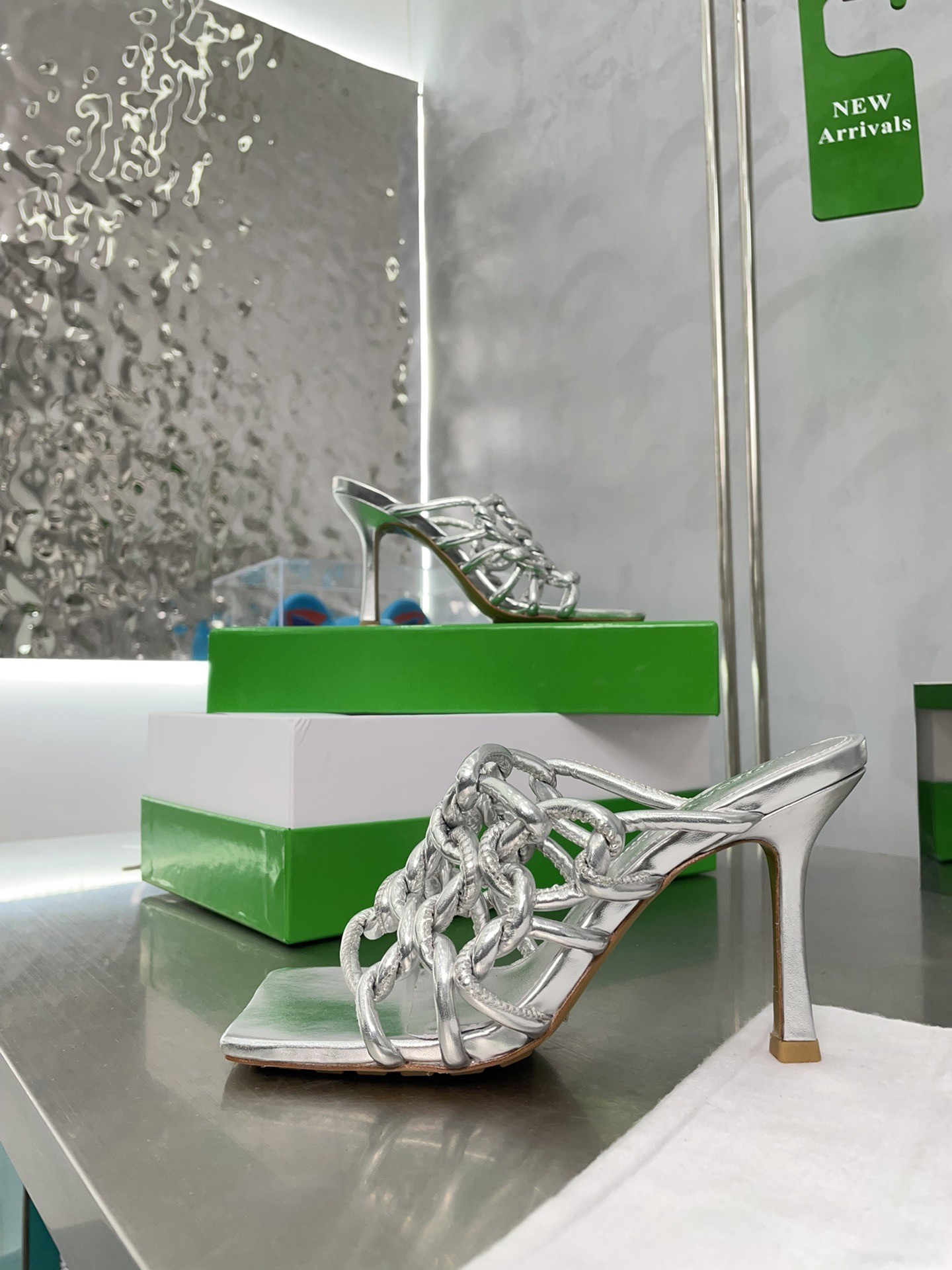 bo*te*ga Ve*ne*ta stretch twist sandals in silver metallic lambskin