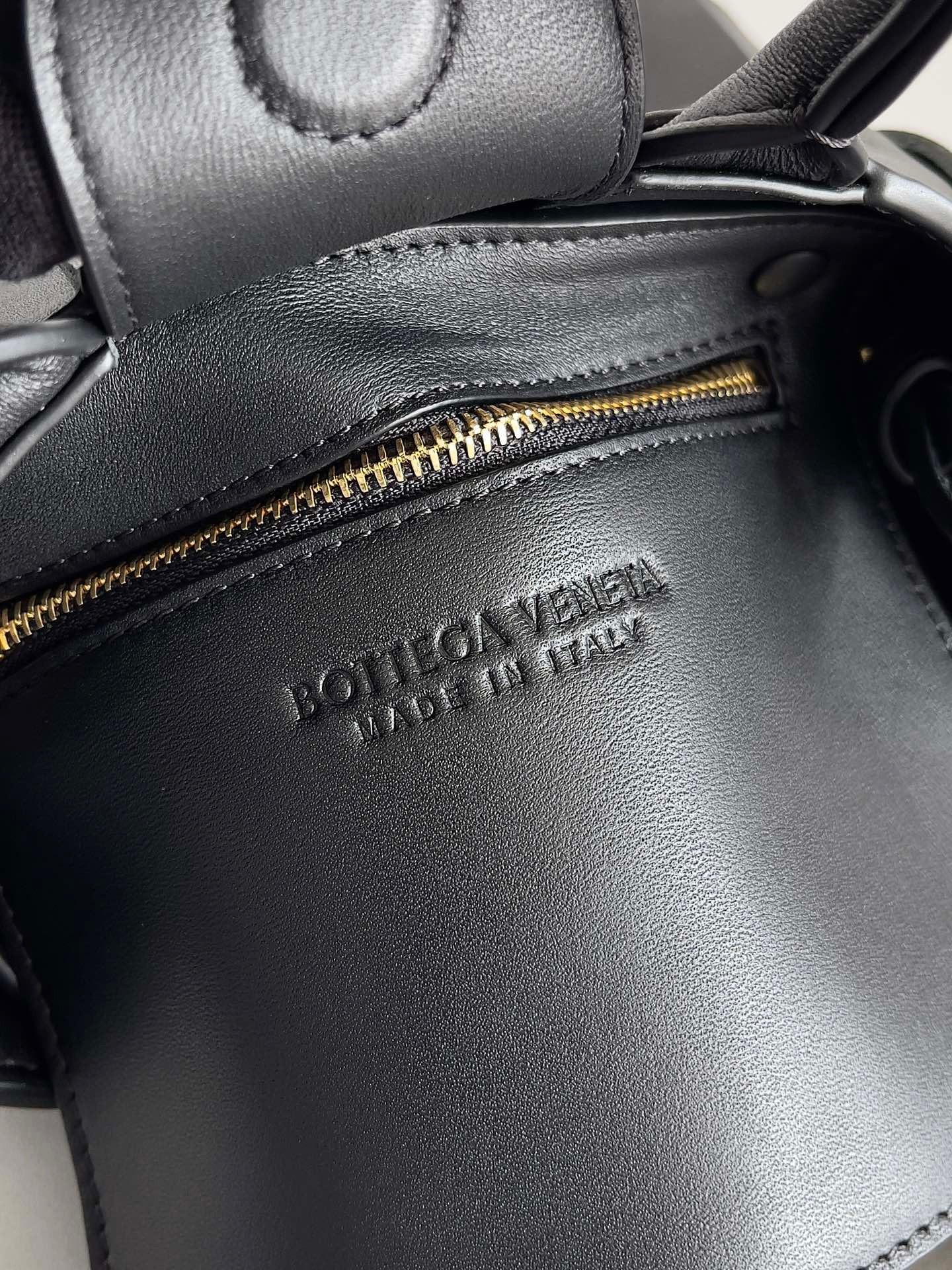 bo*te*ga Ve*ne*ta mini cassette tote bag in black lambskin