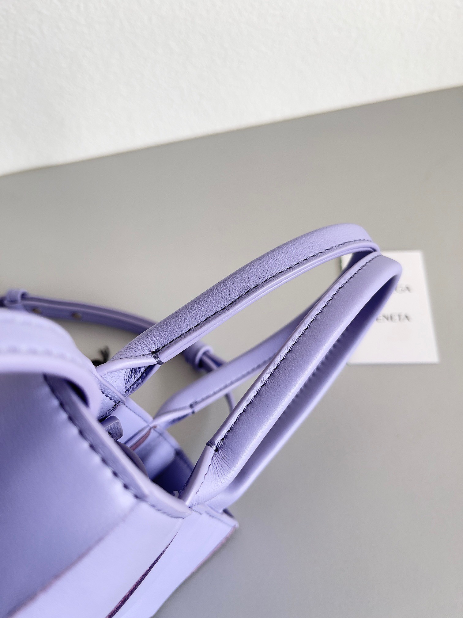 bo*te*ga Ve*ne*ta mini cassette tote bag in wisteria lambskin