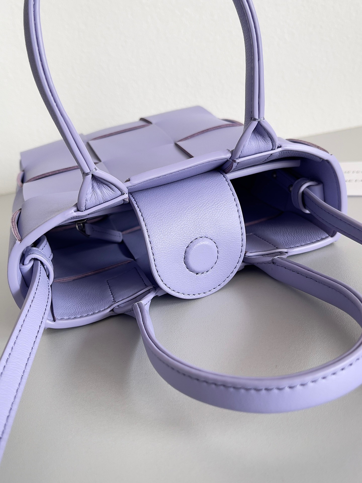 bo*te*ga Ve*ne*ta mini cassette tote bag in wisteria lambskin
