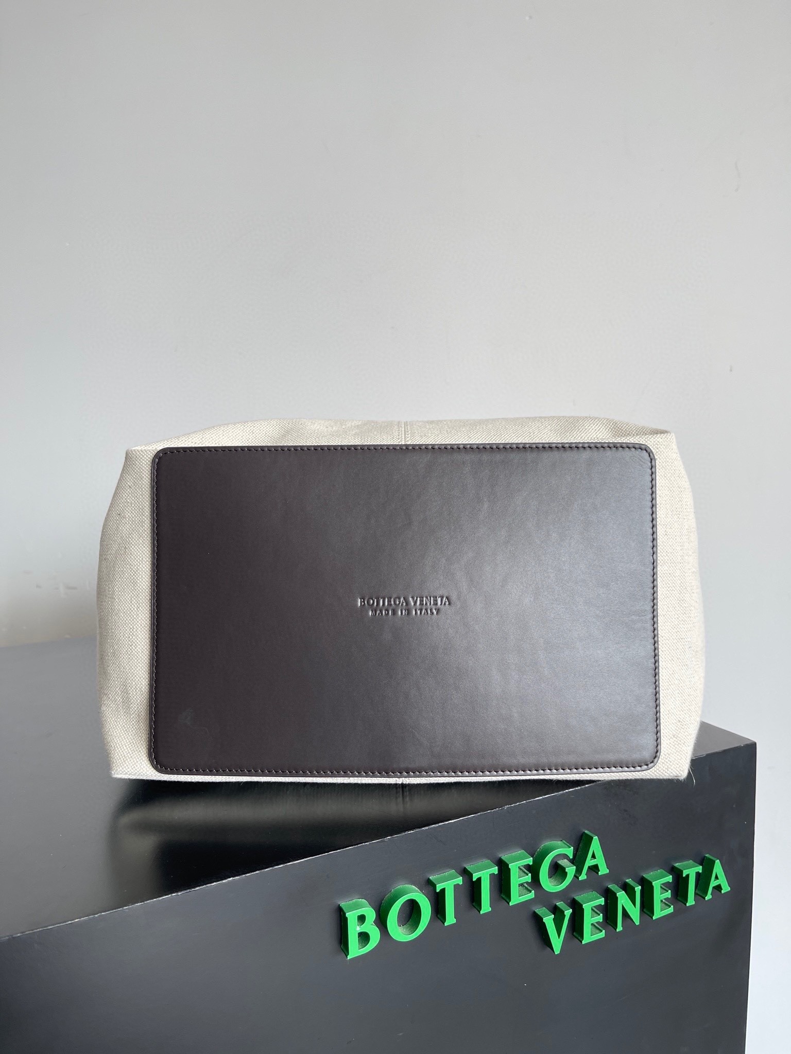 bo*te*ga Ve*ne*ta medium flip flap bag in canvas with fondant leather