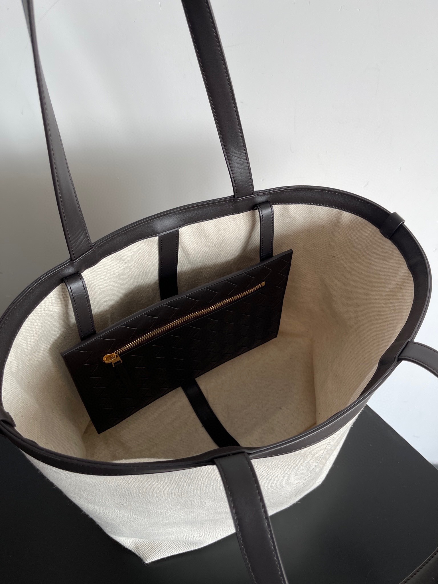 bo*te*ga Ve*ne*ta medium flip flap bag in canvas with fondant leather