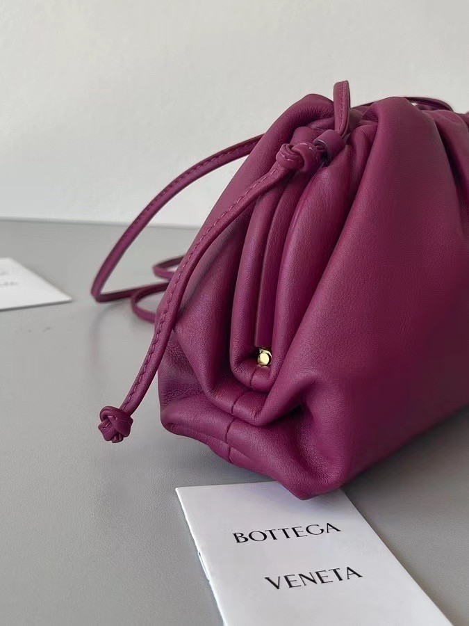 bo*te*ga Ve*ne*ta mini pouch in cinnabar calfskin