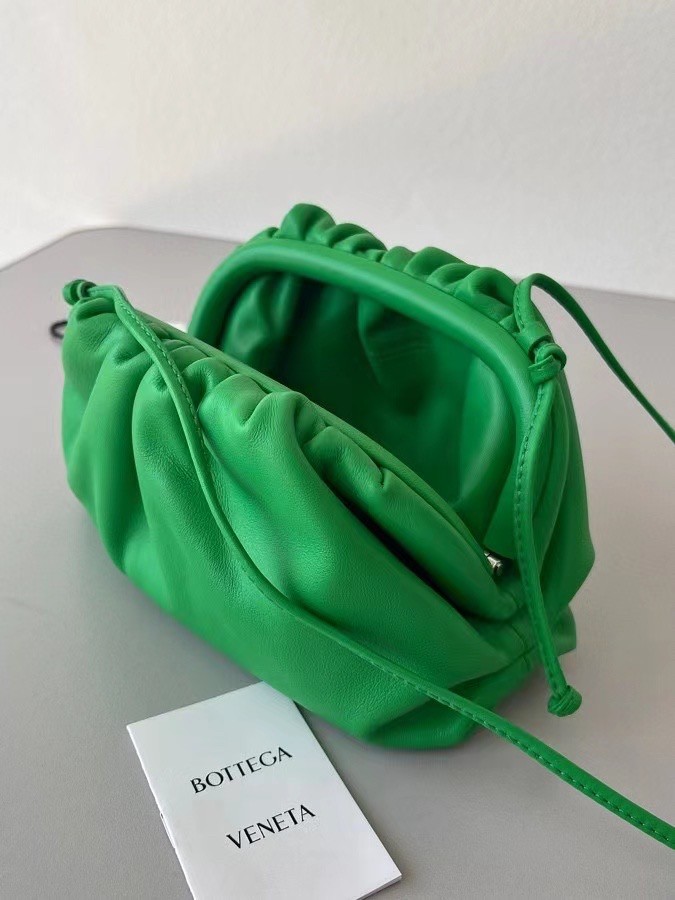 bo*te*ga Ve*ne*ta mini pouch in green calfskin