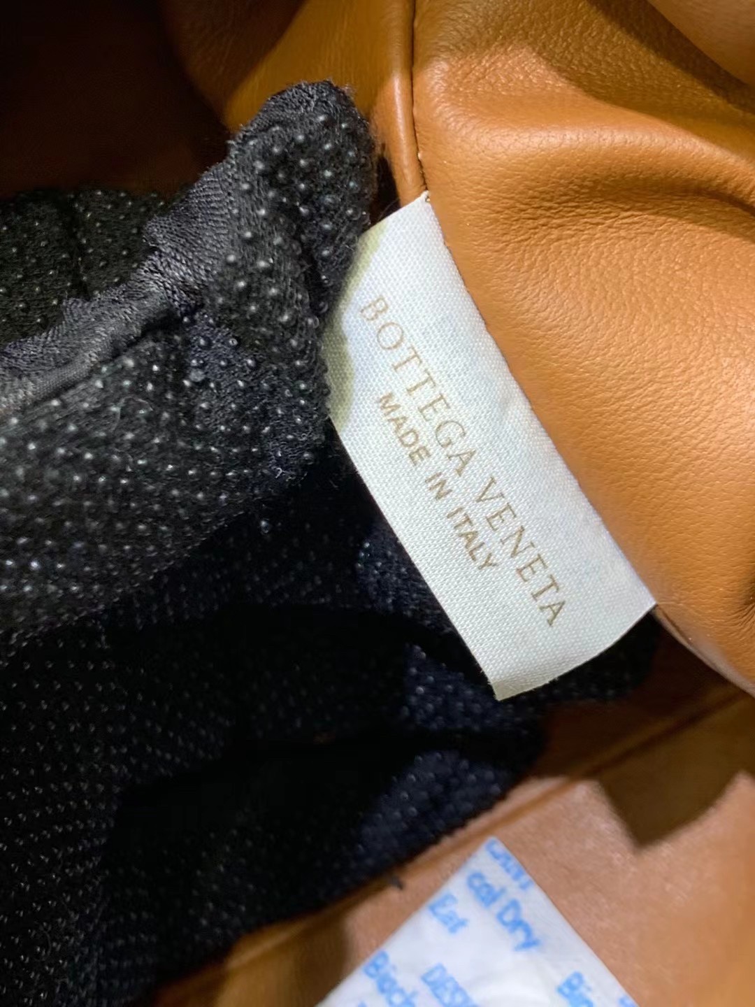 bo*te*ga Ve*ne*ta mini pouch in caramel intrecciato lambskin