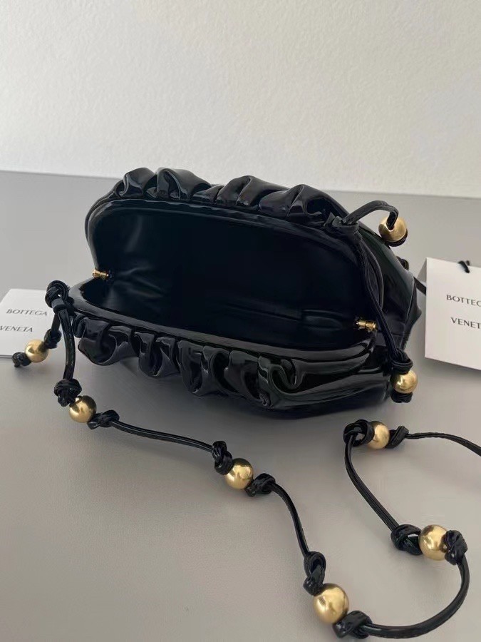 bo*te*ga Ve*ne*ta mini pouch in black patent leather
