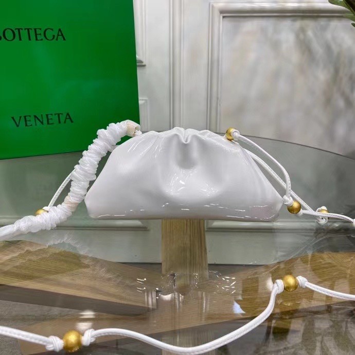bo*te*ga Ve*ne*ta mini pouch in white patent leather
