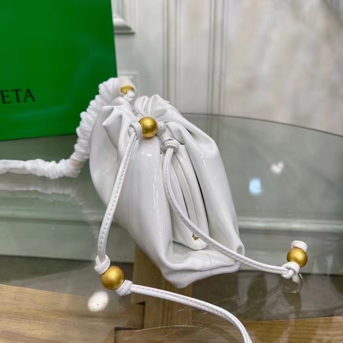 bo*te*ga Ve*ne*ta mini pouch in white patent leather