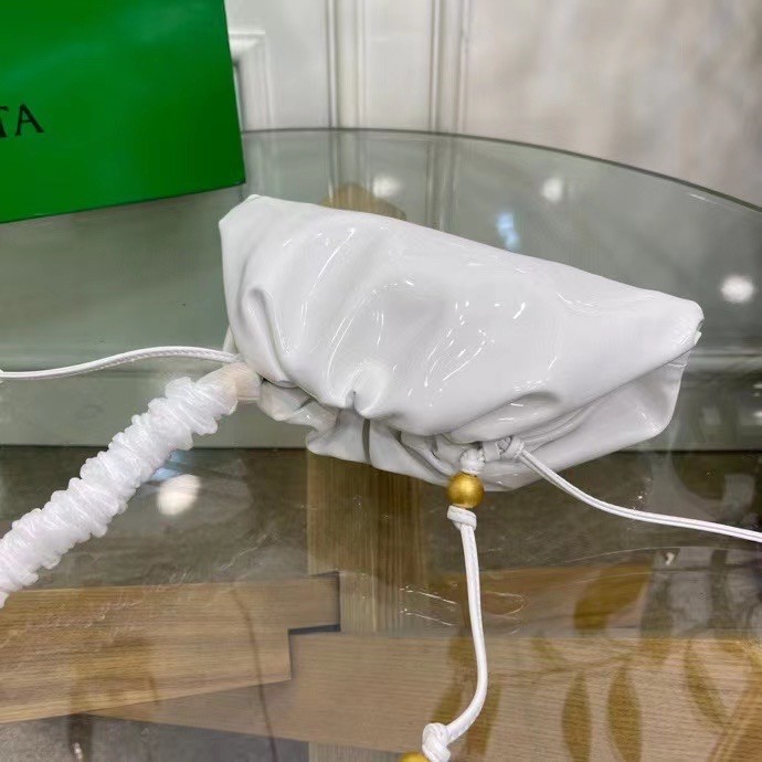 bo*te*ga Ve*ne*ta mini pouch in white patent leather