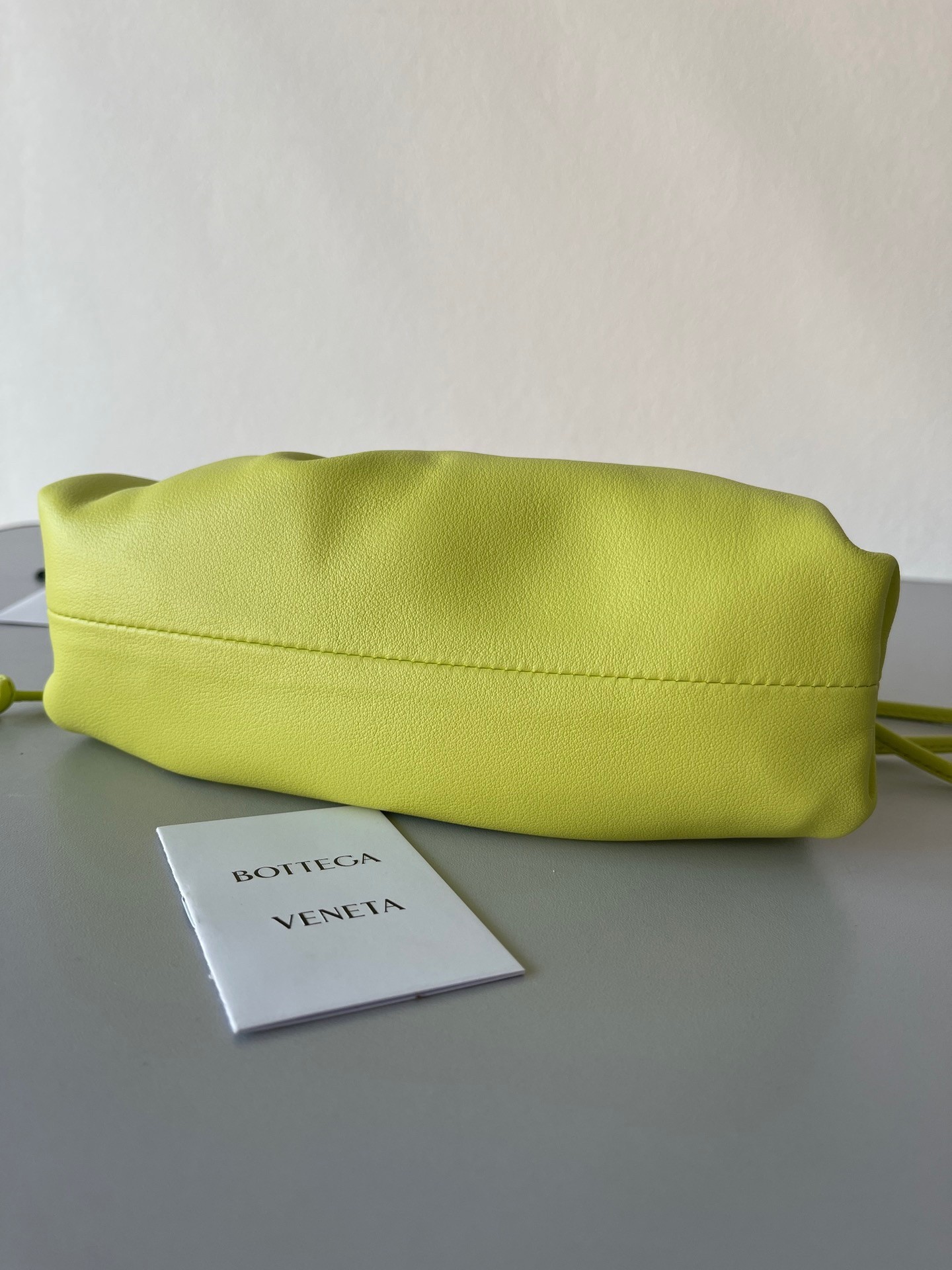 bo*te*ga Ve*ne*ta mini pouch bag in kiwi calfskin