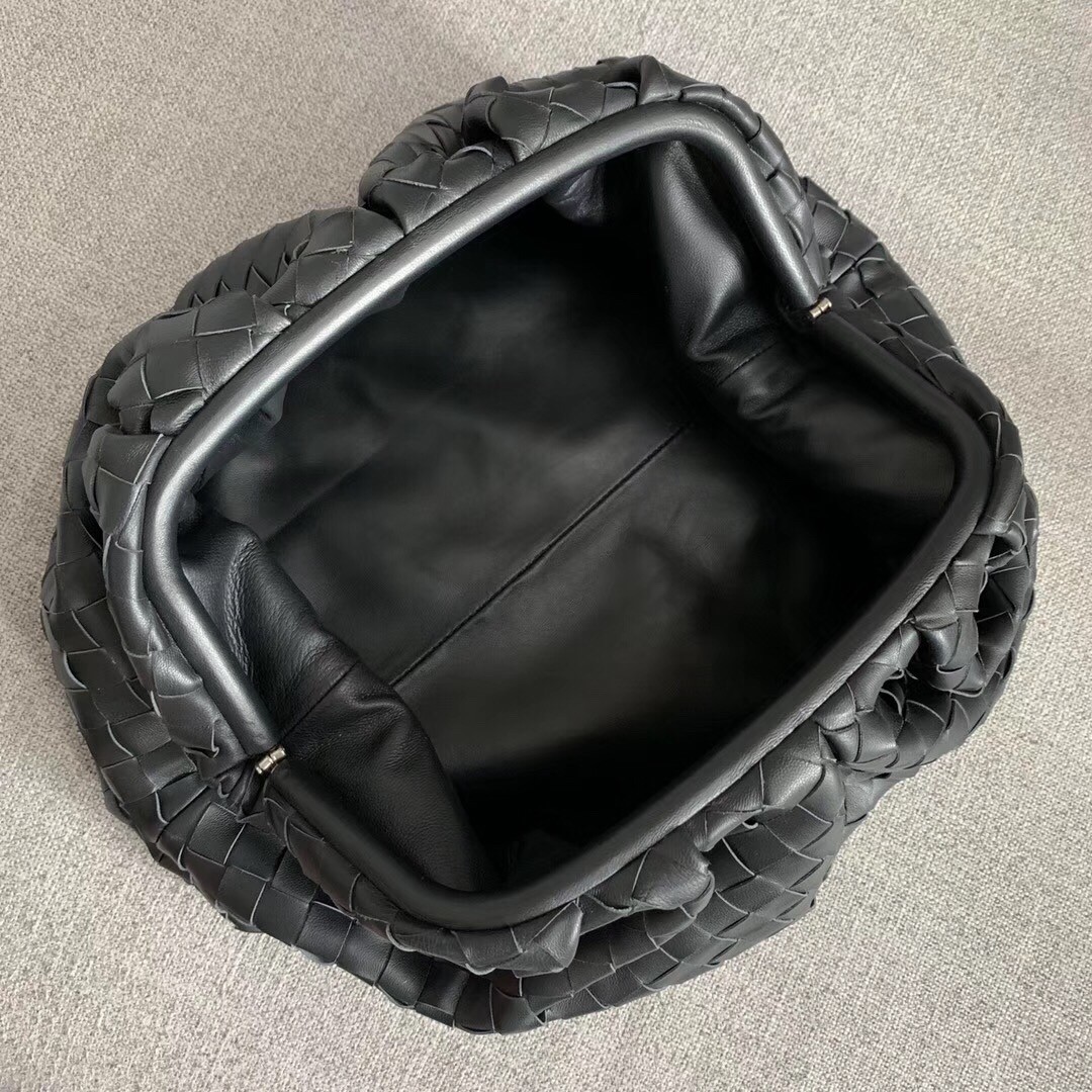 bo*te*ga Ve*ne*ta the pouch clutch in black intrecciato leather