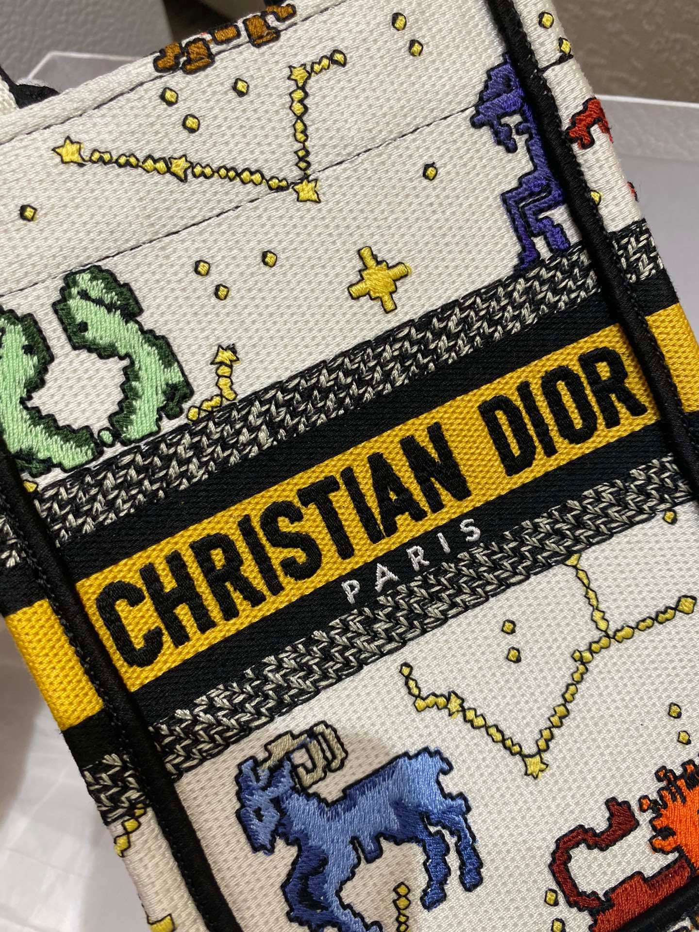 D*or mini book tote phone bag in white pixel zodiac embroidery