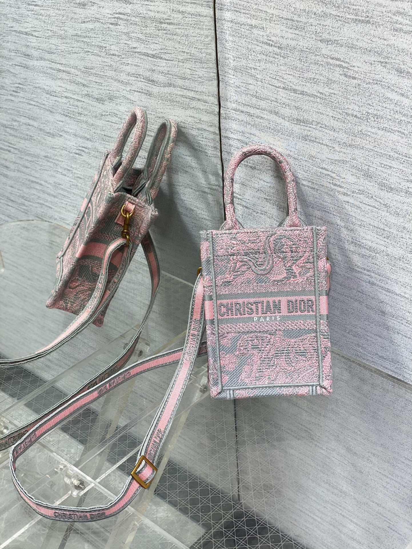 D*or mini D*oriviera book tote phone bag in pink toile de jouy reverse embroidery