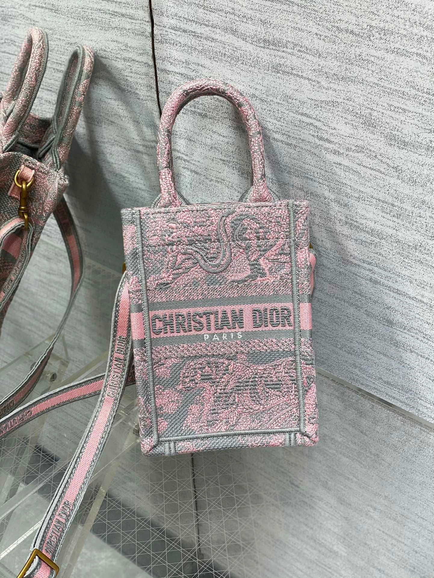 D*or mini D*oriviera book tote phone bag in pink toile de jouy reverse embroidery