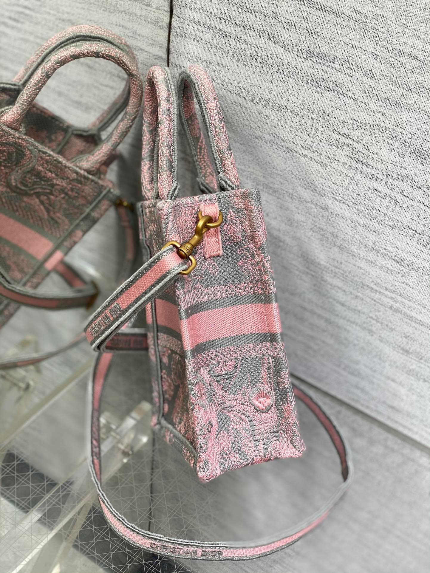D*or mini D*oriviera book tote phone bag in pink toile de jouy reverse embroidery