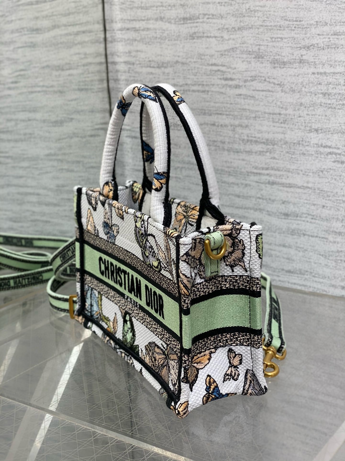 D*or mini book tote with strap in white toile de jouy mexico embroidery