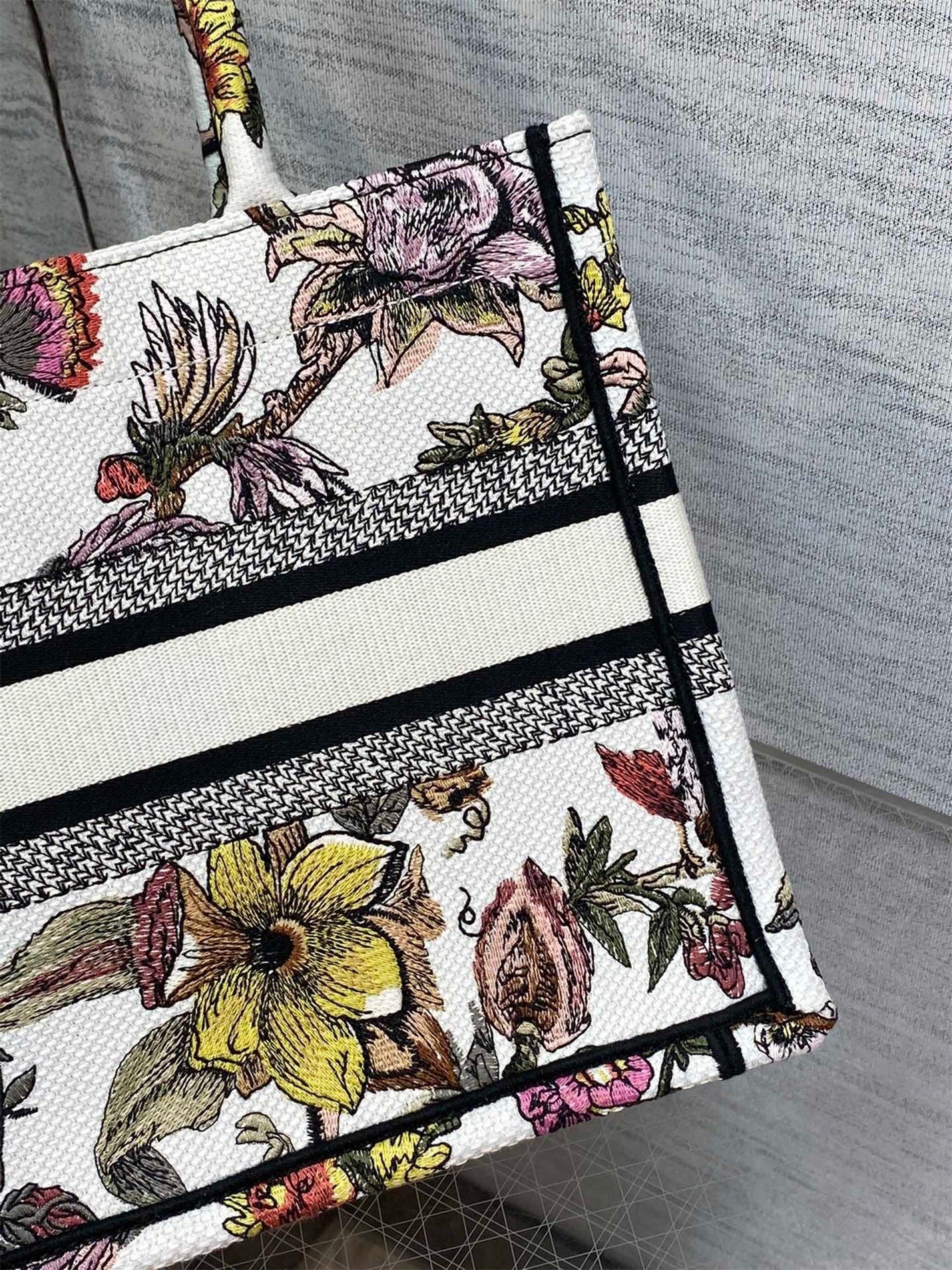 D*or small book tote bag in white multicolor jardin botanique embroidery