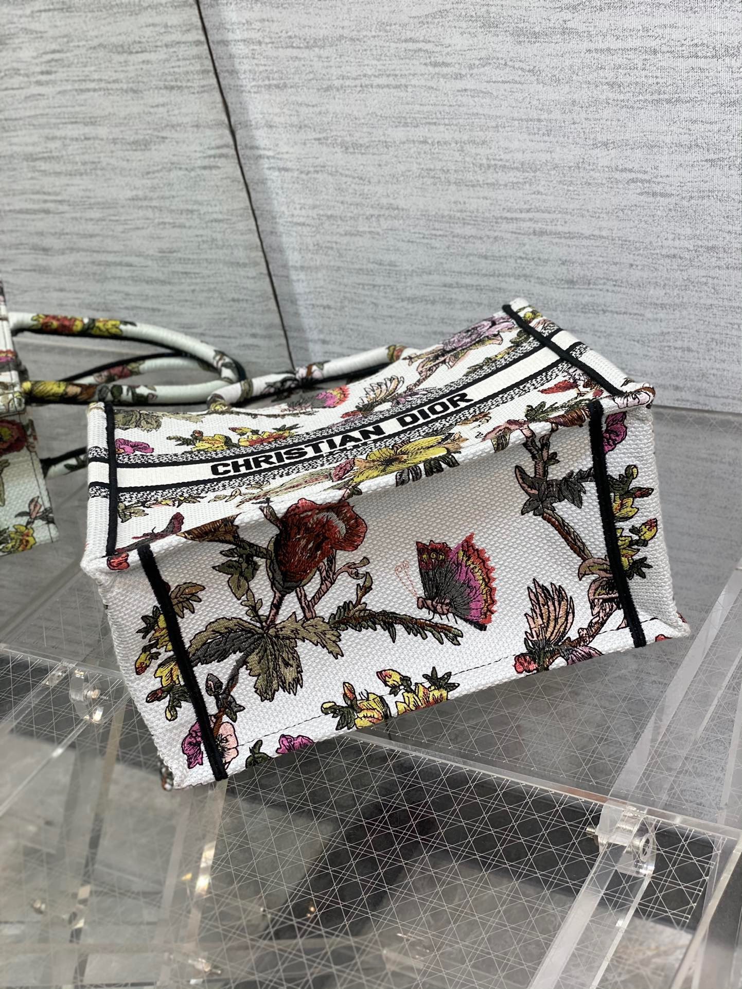 D*or small book tote bag in white multicolor jardin botanique embroidery