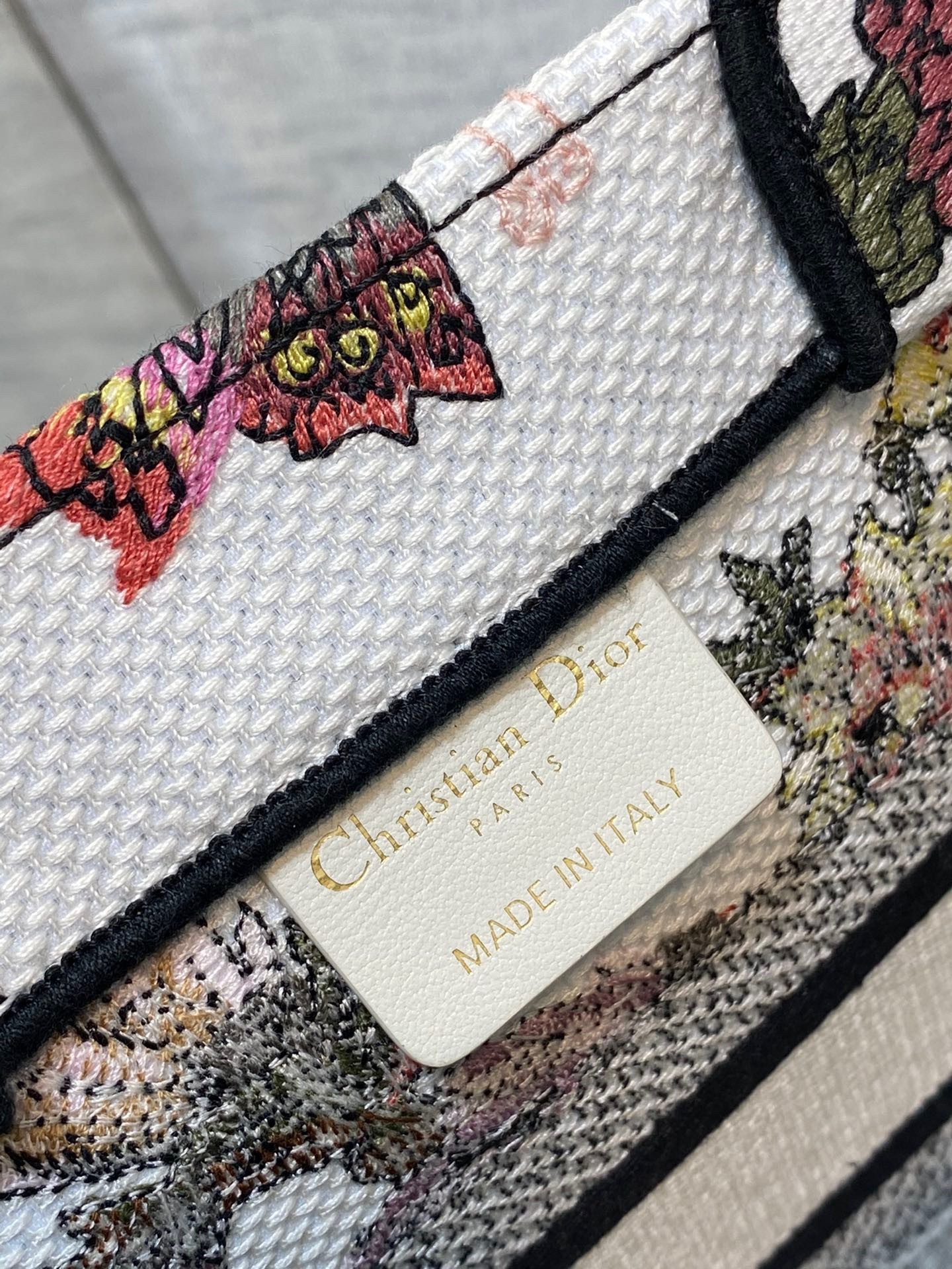 D*or small book tote bag in white multicolor jardin botanique embroidery