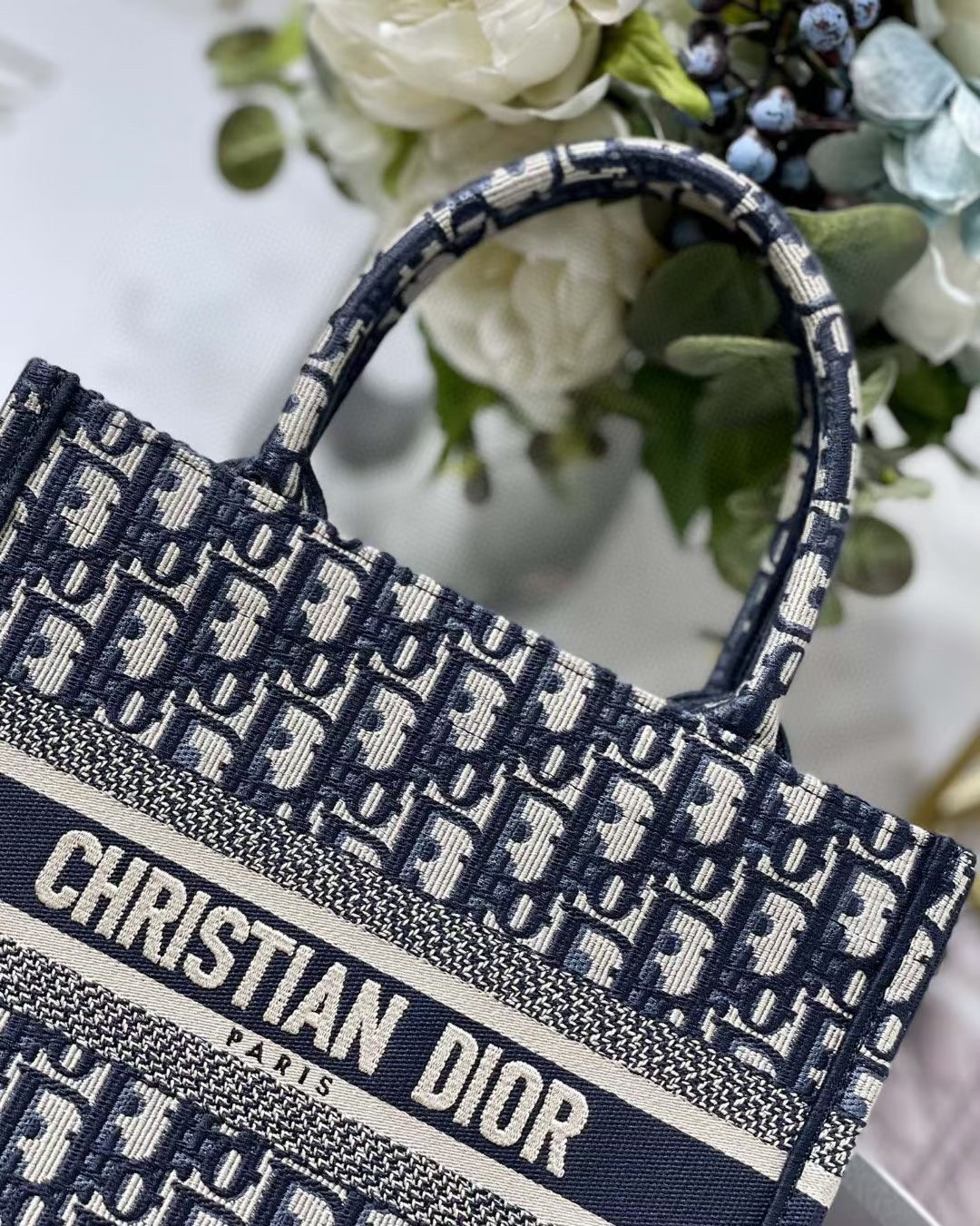 D*or new small book tote in blue D*or oblique jacquard