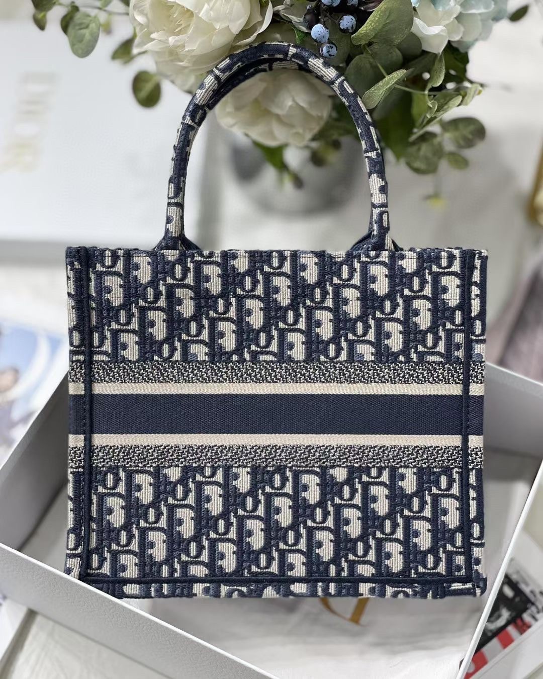 D*or new small book tote in blue D*or oblique jacquard