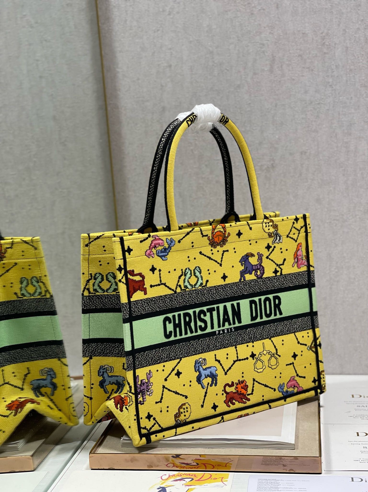 D*or small book tote bag in yellow multicolor pixel zodiac embroidery