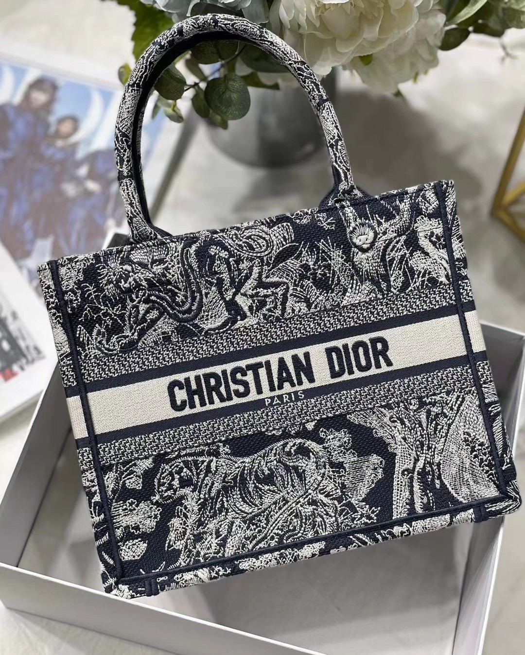 D*or new small book tote in blue toile de jouy reverse embroidery