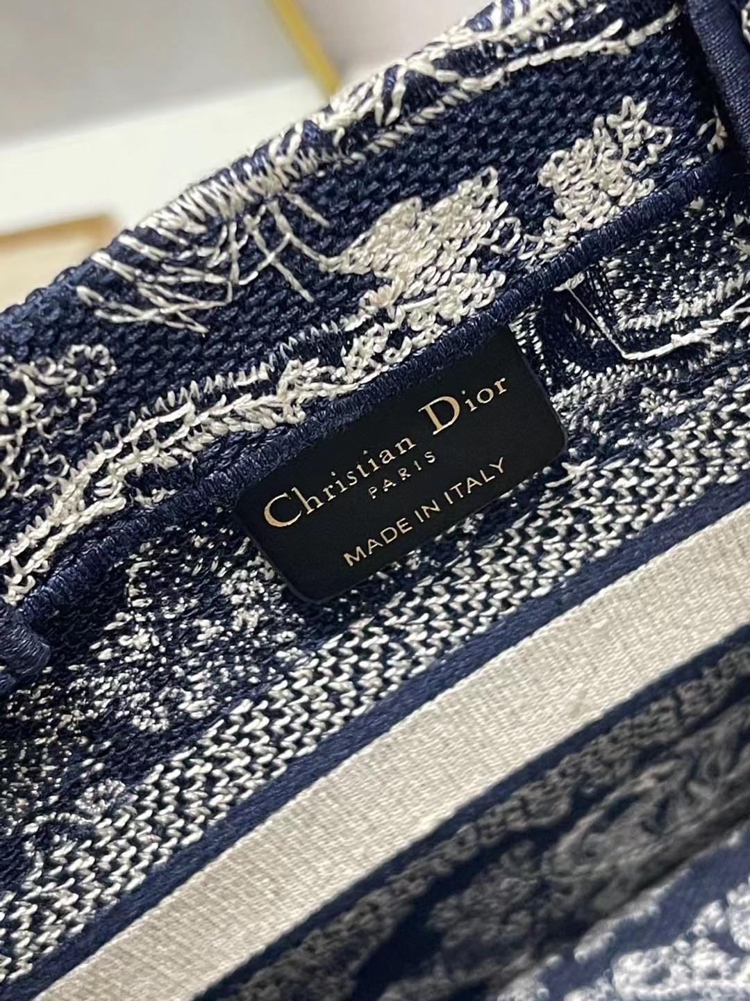 D*or new small book tote in blue toile de jouy reverse embroidery