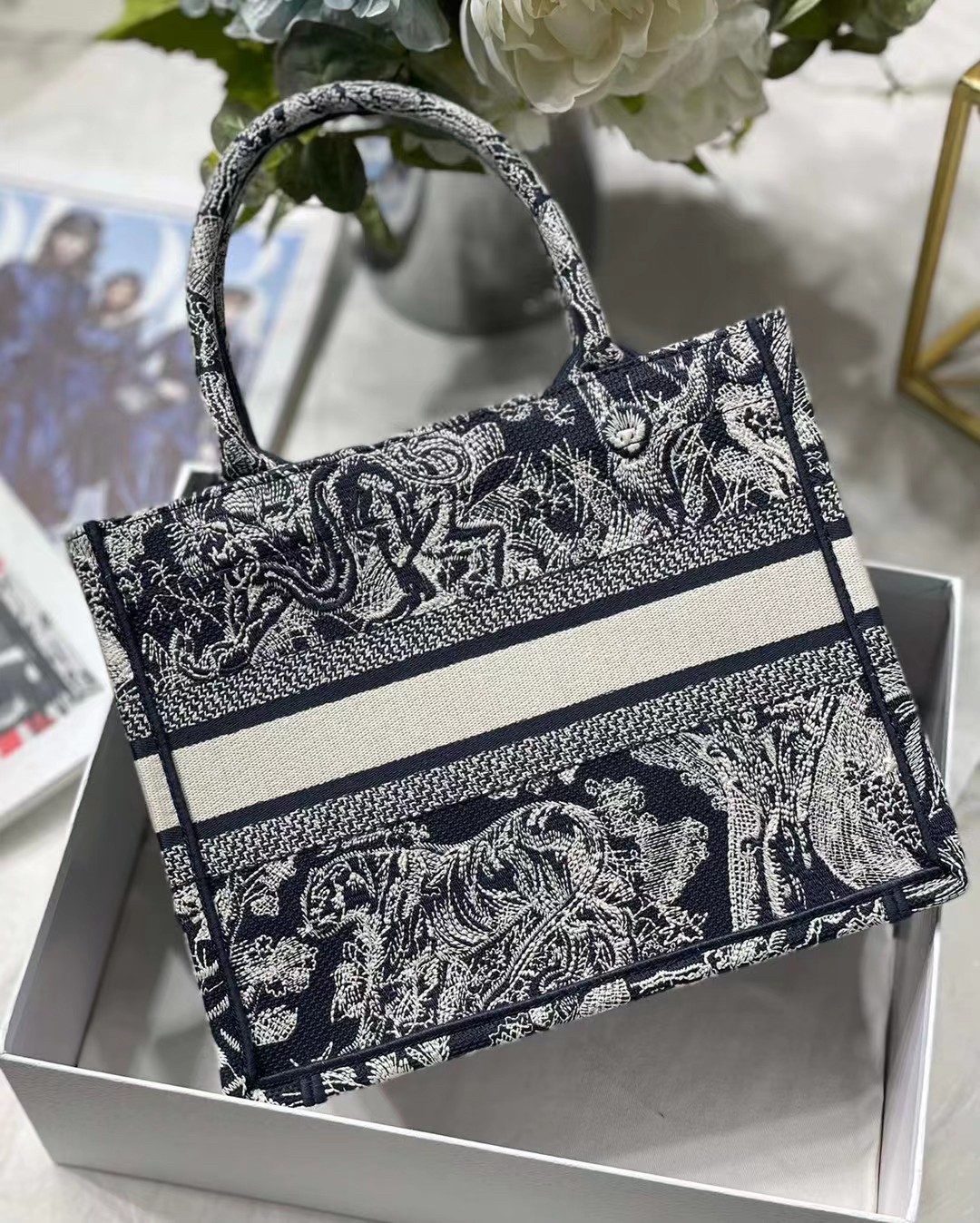 D*or new small book tote in blue toile de jouy reverse embroidery
