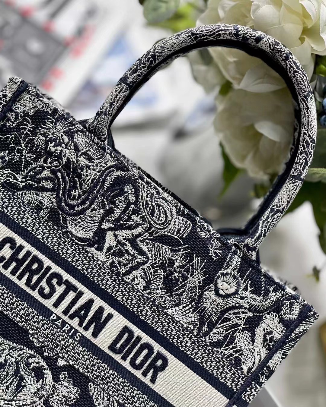 D*or new small book tote in blue toile de jouy reverse embroidery