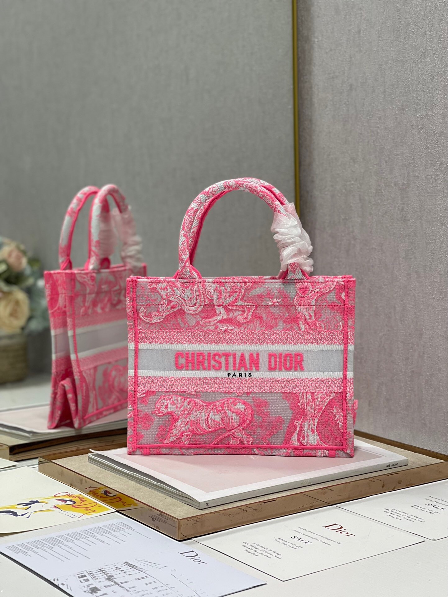 D*or small book tote bag in pink transparent toile de jouy canvas
