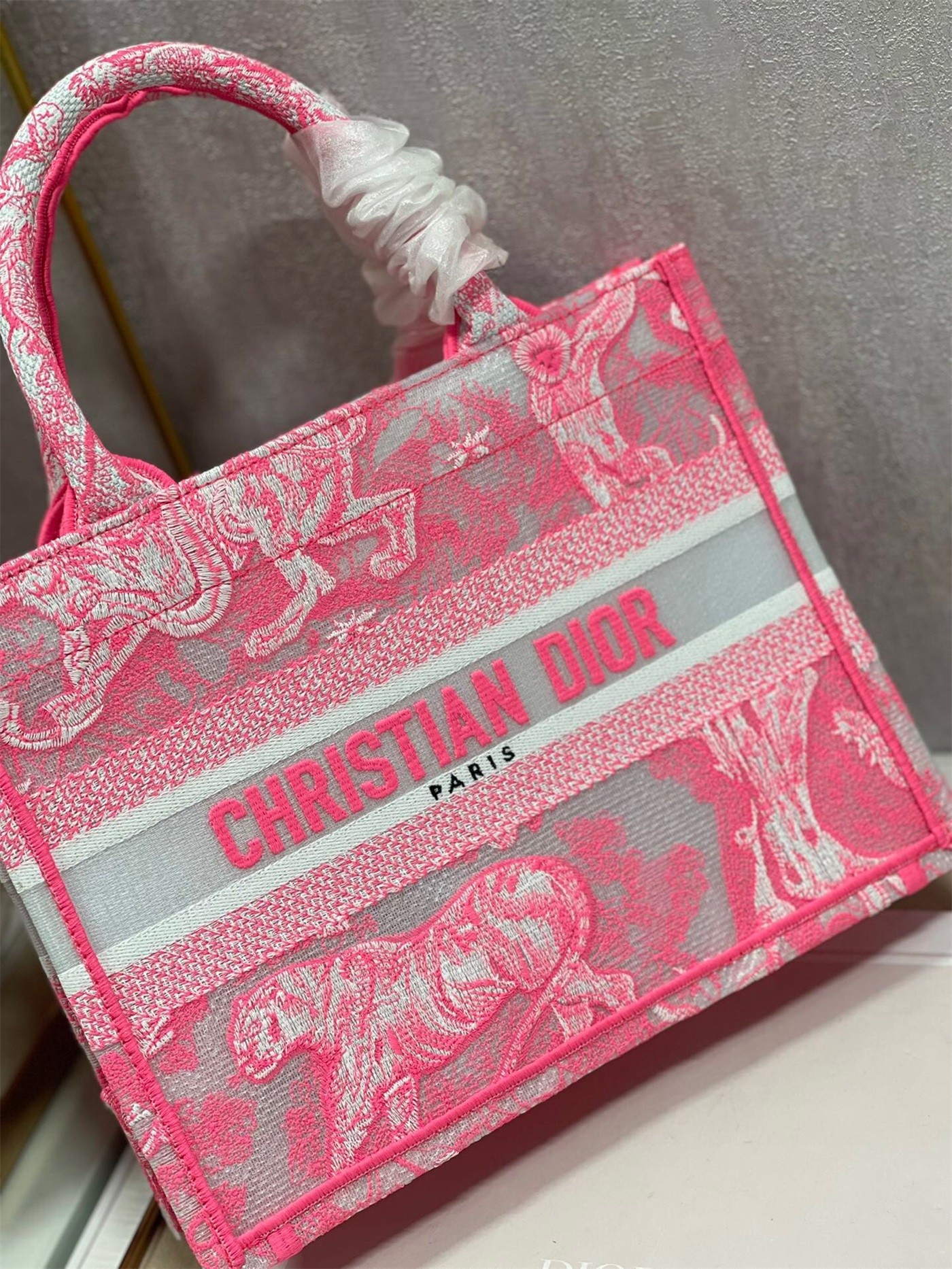 D*or small book tote bag in pink transparent toile de jouy canvas