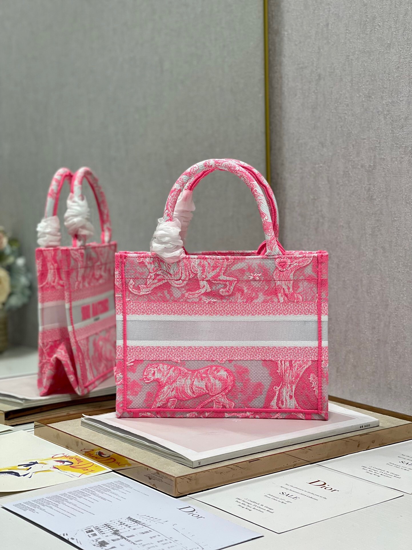 D*or small book tote bag in pink transparent toile de jouy canvas