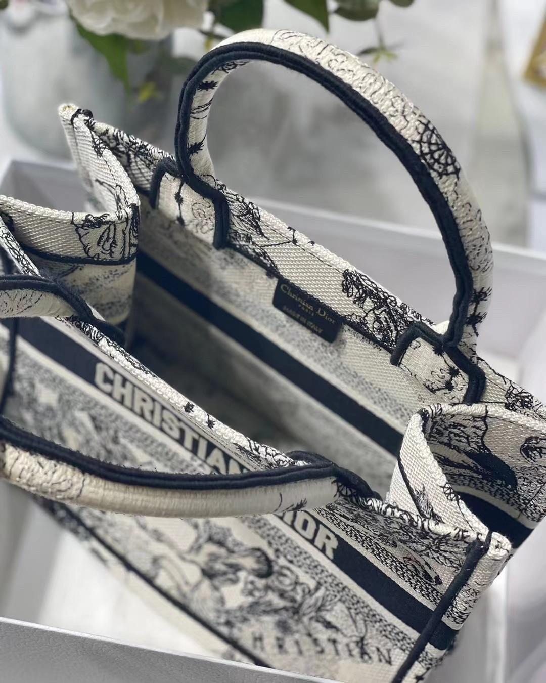 D*or new small book tote in white toile de jouy zodiac embroidery