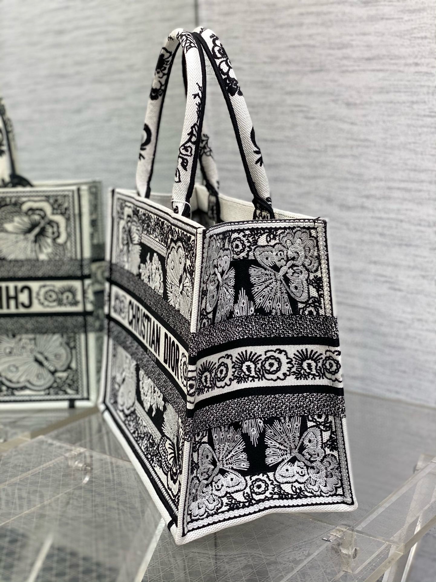 D*or medium book tote bag in black and white butterfly bandana embroidery