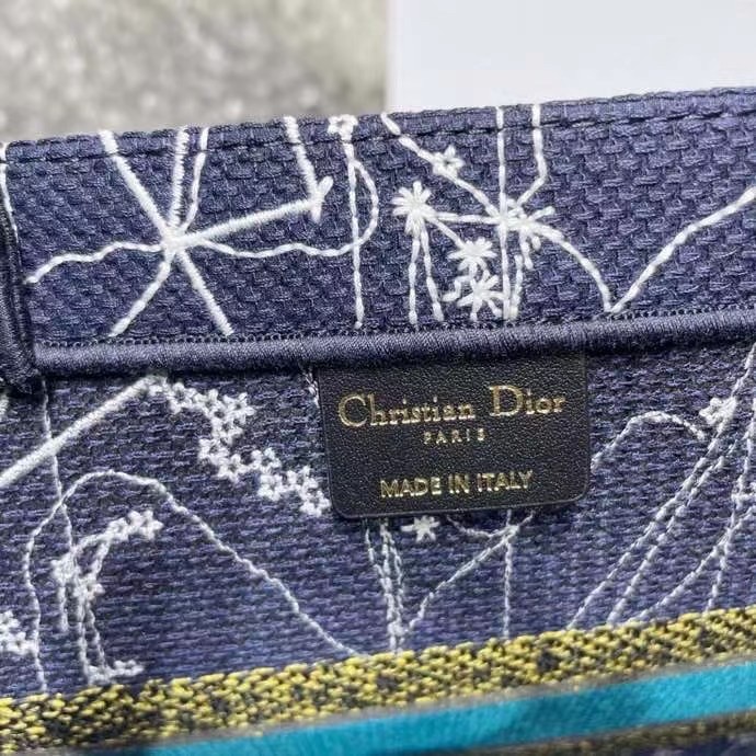 D*or small book tote in blue D*or constellation embroidery