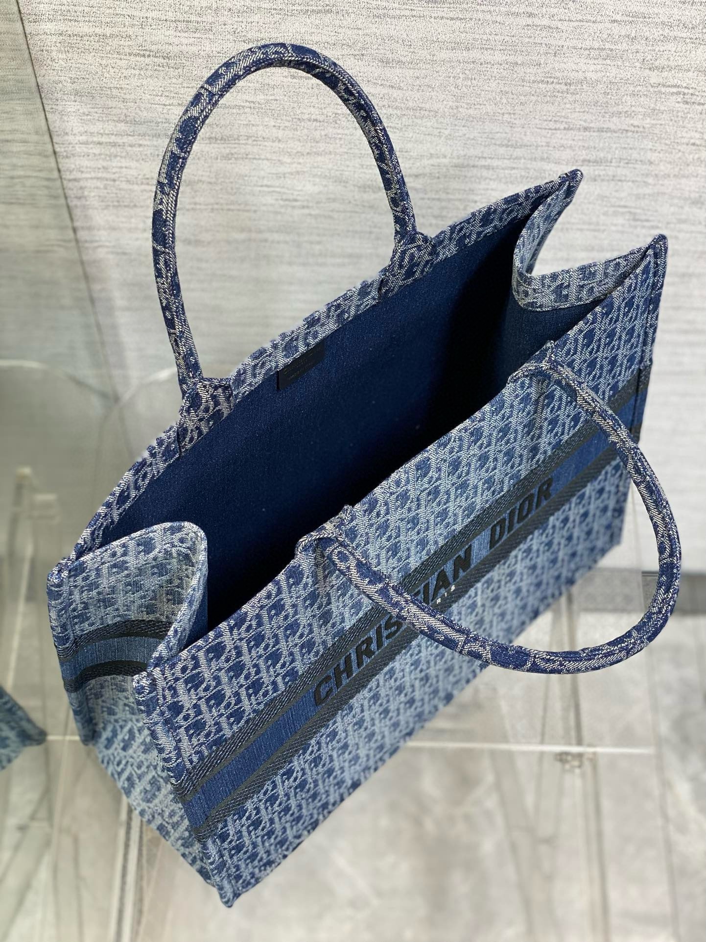 D*or medium book tote bag in blue denim oblique jacquard