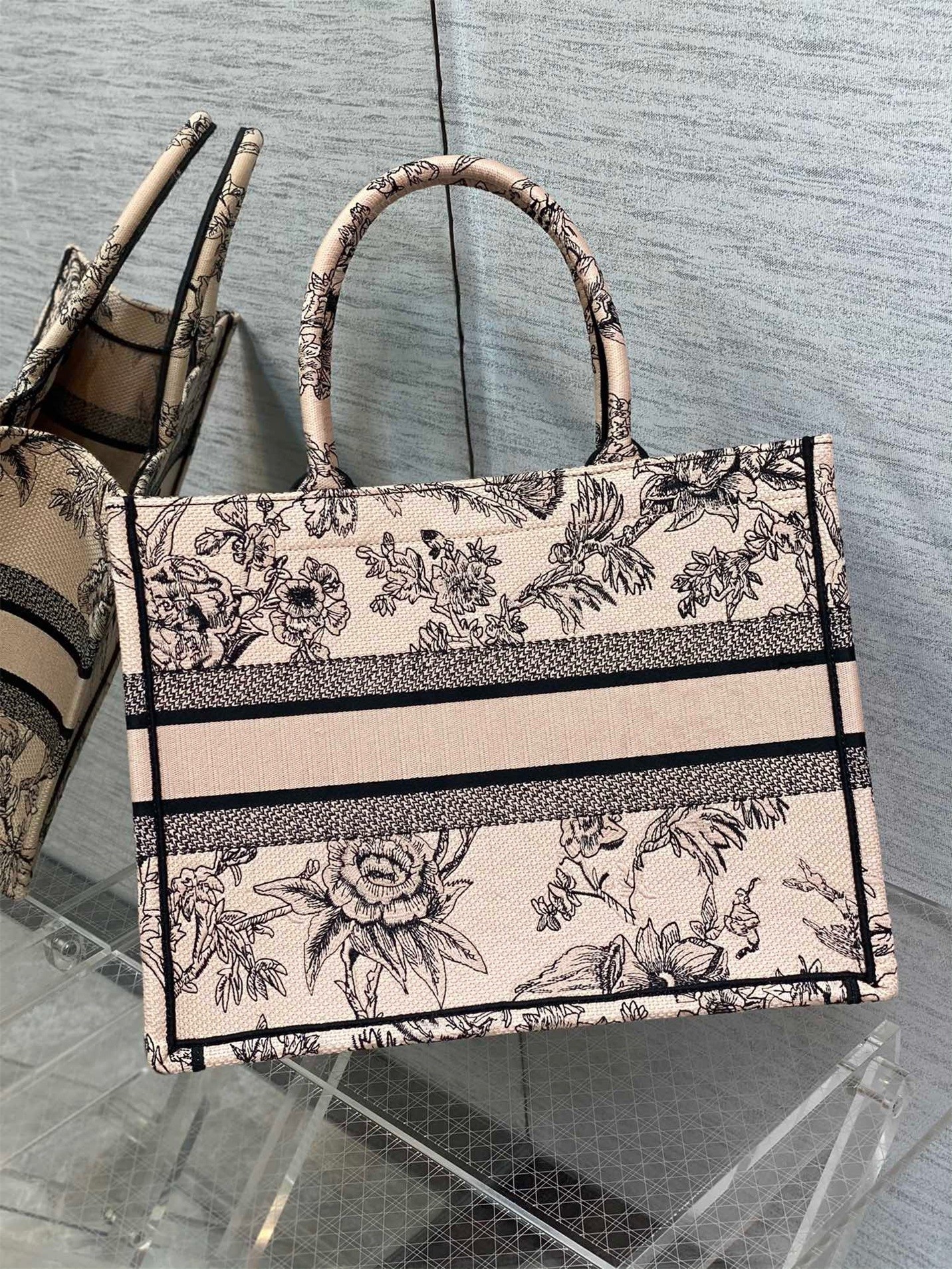 D*or medium book tote bag in powder pink jardin botanique embroidery