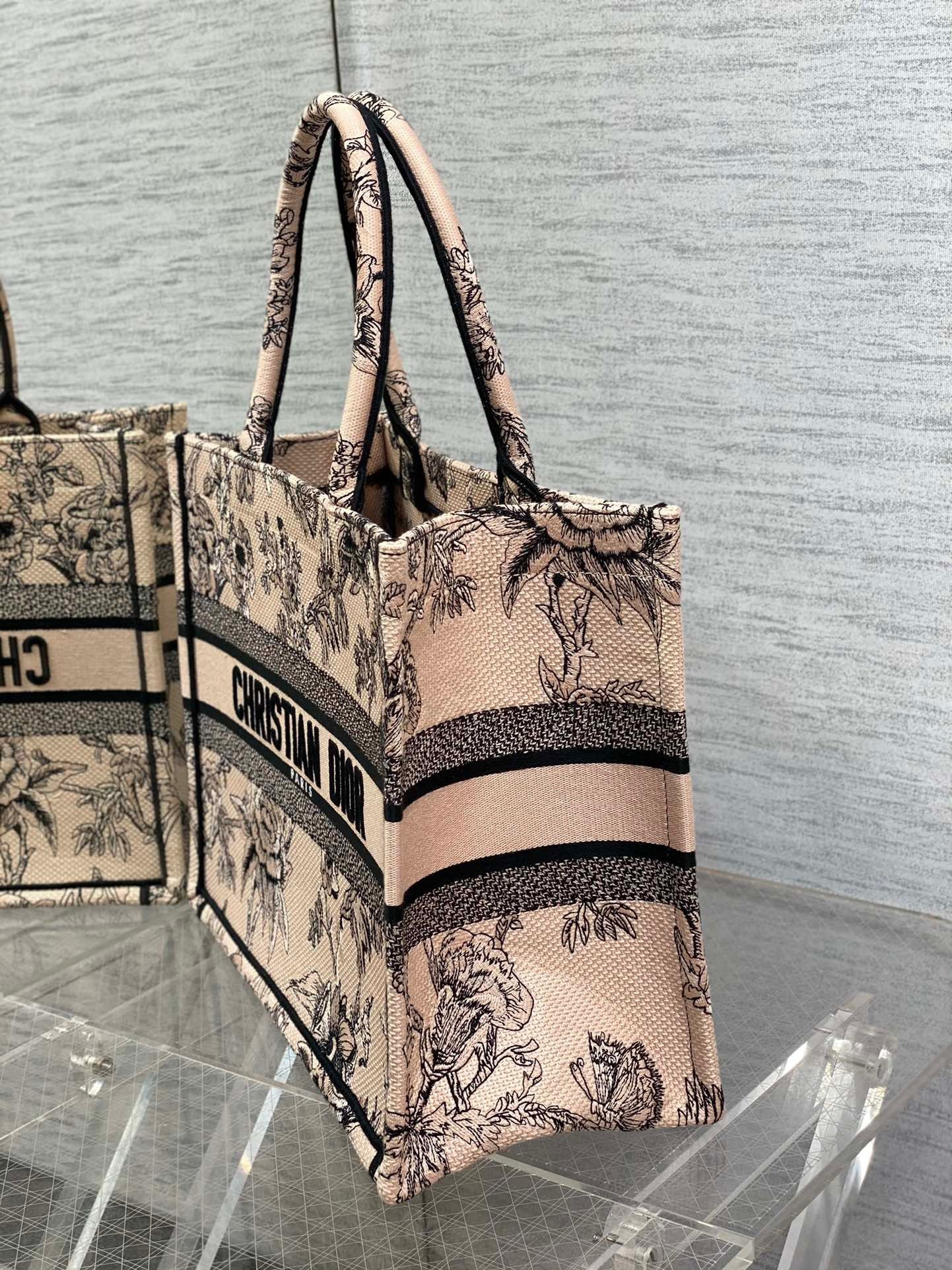 D*or medium book tote bag in powder pink jardin botanique embroidery