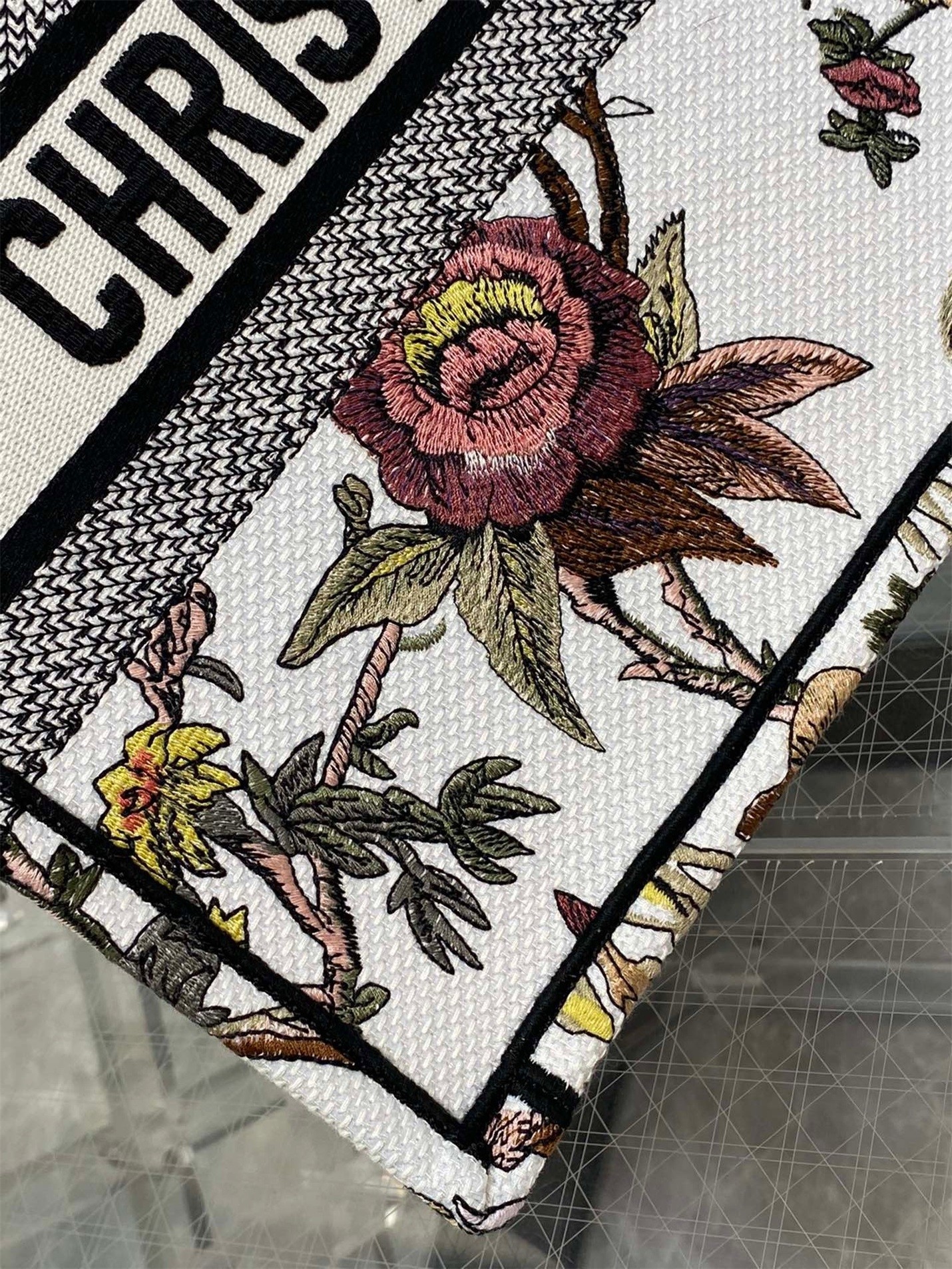 D*or medium book tote bag in white multicolor jardin botanique embroidery