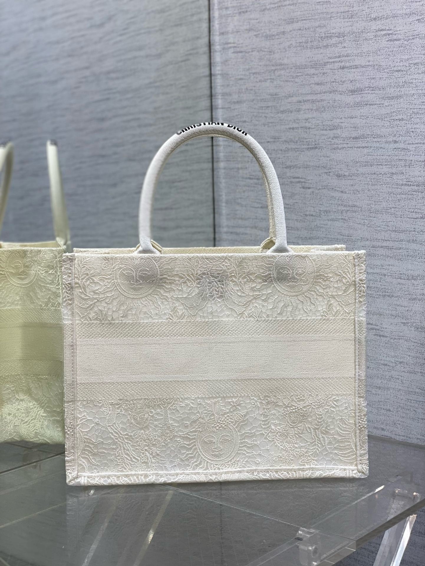 D*or medium book tote bag in white toile de jouy soleil macramé embroidery