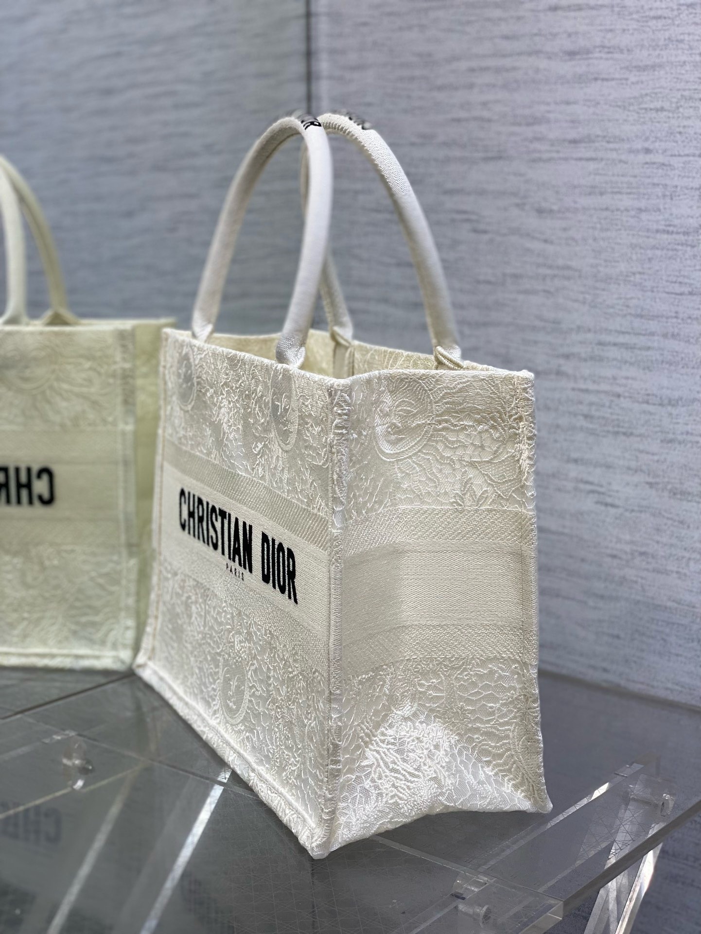 D*or medium book tote bag in white toile de jouy soleil macramé embroidery