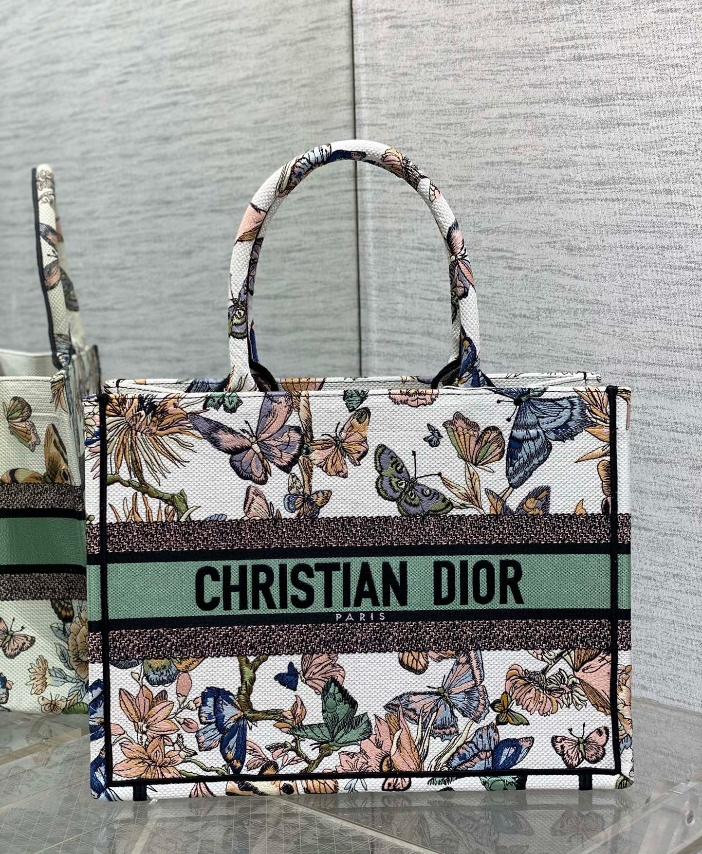 D*or medium book tote bag in white toile de jouy mexico embroidery