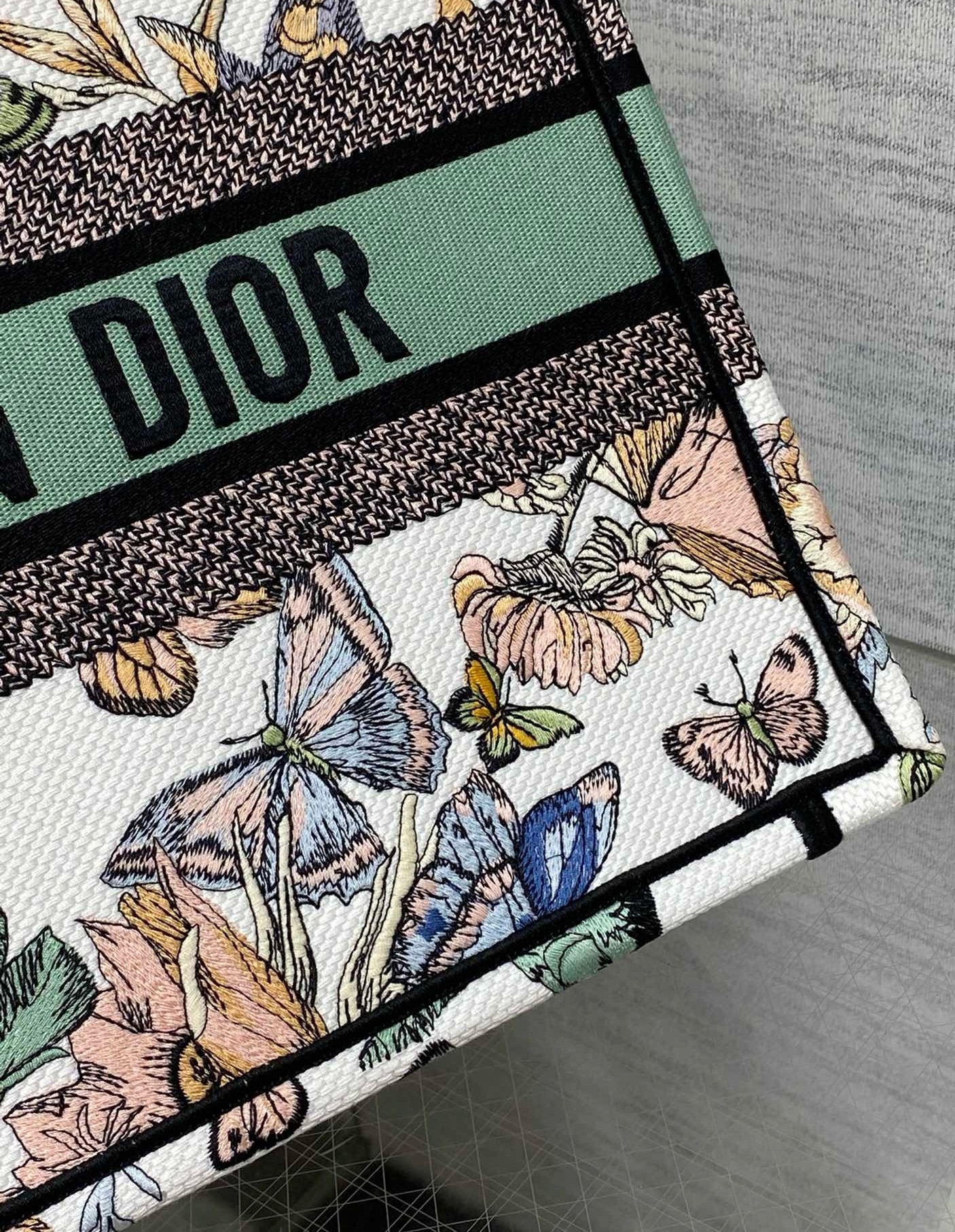 D*or medium book tote bag in white toile de jouy mexico embroidery