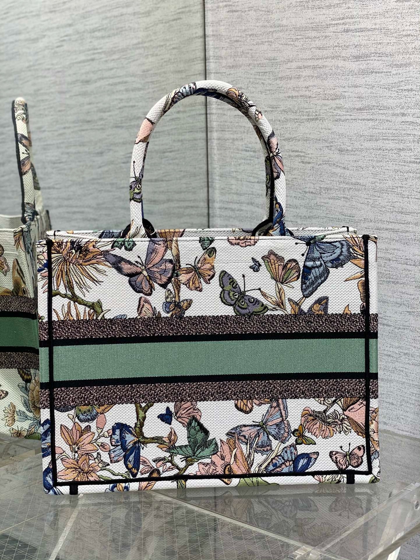 D*or medium book tote bag in white toile de jouy mexico embroidery