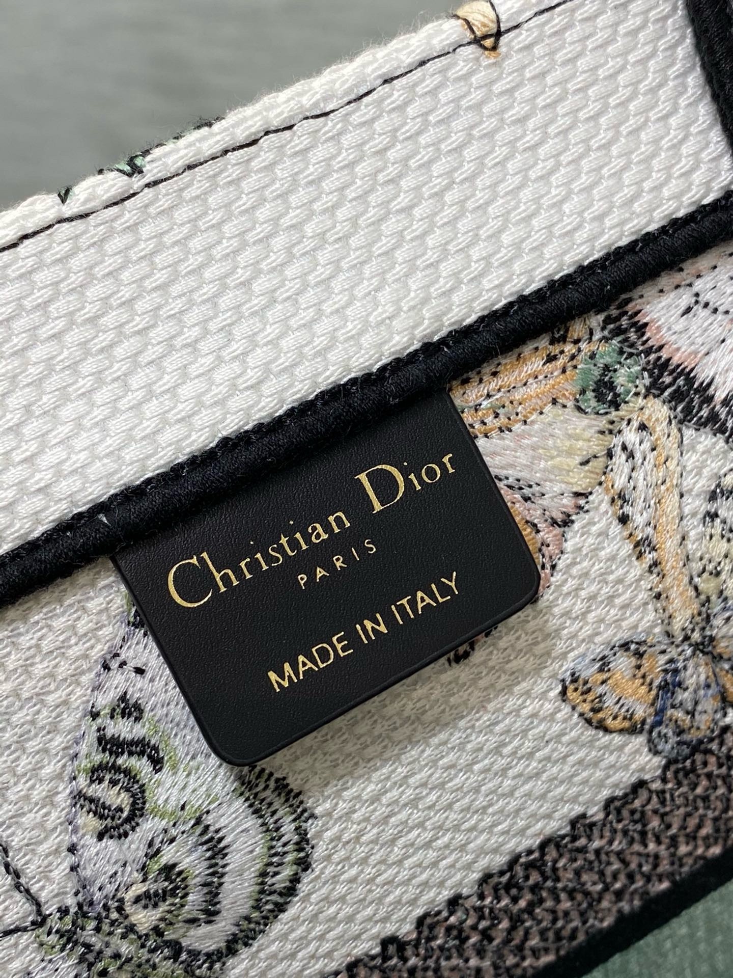 D*or medium book tote bag in white toile de jouy mexico embroidery