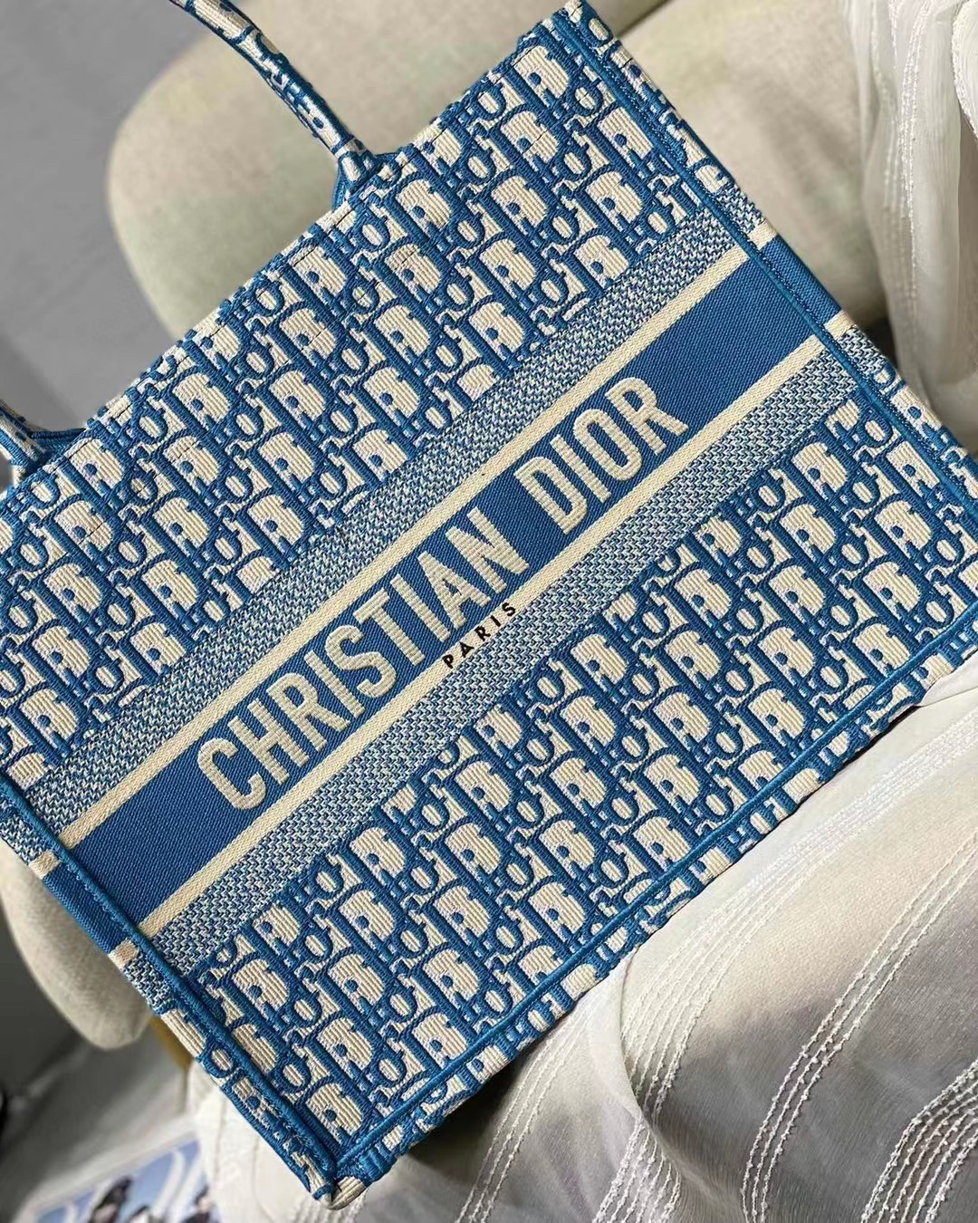 D*or small book tote in cornflower blue D*or oblique embroidery