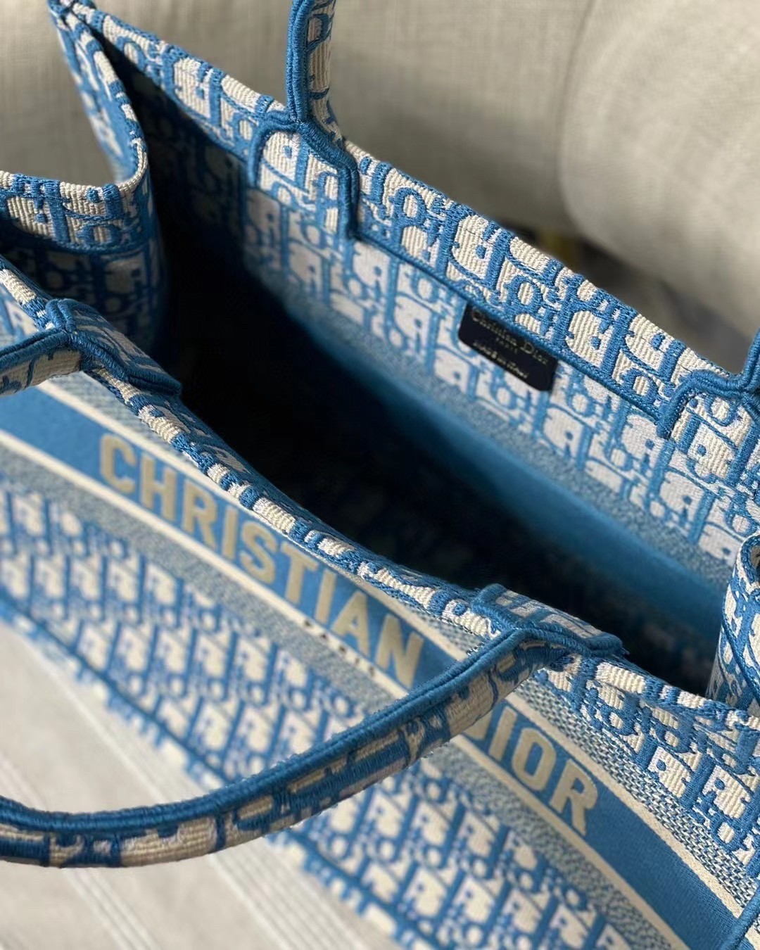 D*or small book tote in cornflower blue D*or oblique embroidery